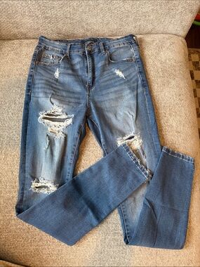 Classic Distressed Women’s Jegging - Medium Blue. 12 LONG